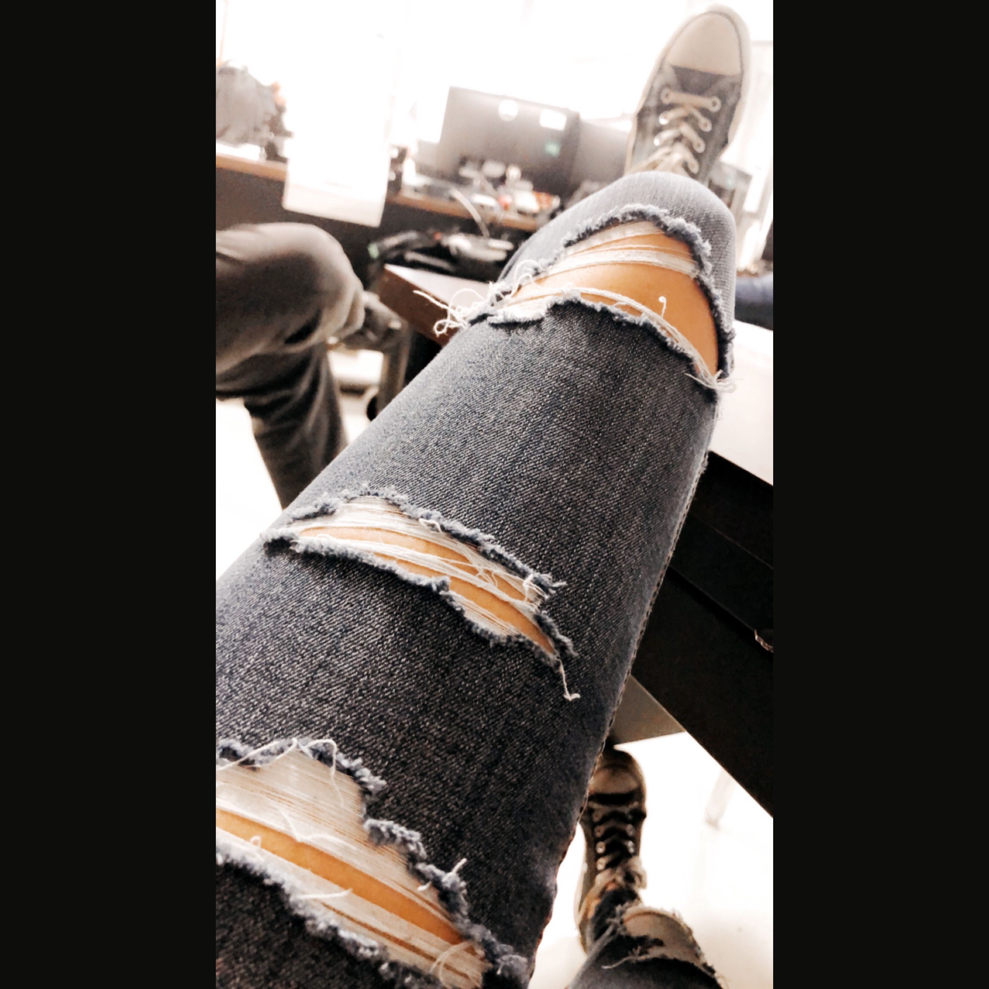converse and ripped jeans