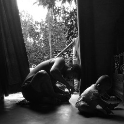 beingparents daughter girl child mobilephotography blackandwhite family emotions indoors rain nature door curtains wind