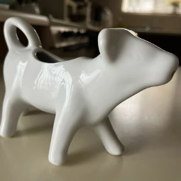 whiteiseephotographychallenge challengeaccepted hownowwhitecow creamer cow ceramicart kitchenutensils whiteaesthetic myphotography shotoniphone13 heypicsart local pcwhiteisee whiteisee
